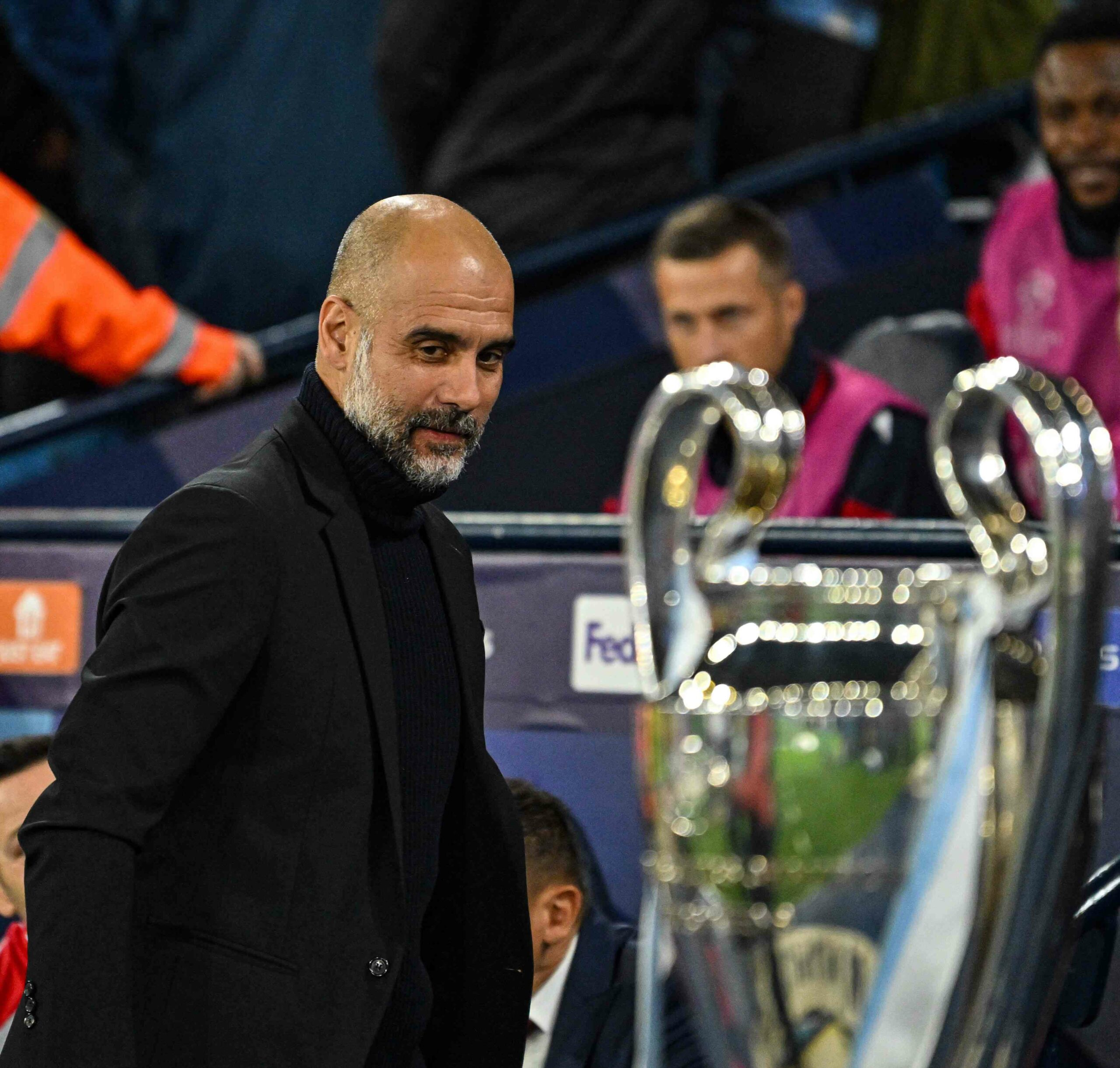 Pep Guardiola gazing at the Champions League trophy before the final